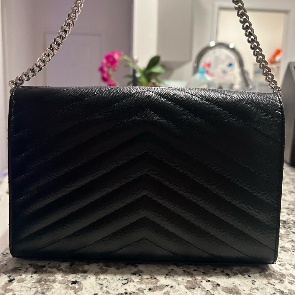 Saint Laurent Black Crossbody Bag with Quilted Texture and Gold Logo - Picture 2 of 3